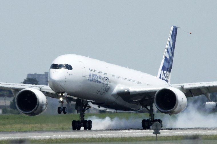 The new Airbus A350 lands at Toulouse-Blagnac airport after its maiden flight in southwestern France last week.