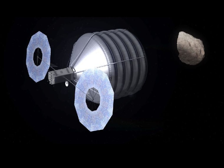 An artist's conception shows a robotic probe, powered by a solar electric propulsion system, closing in to corral an asteroid. NASA is aiming to send out such a probe in 2017.