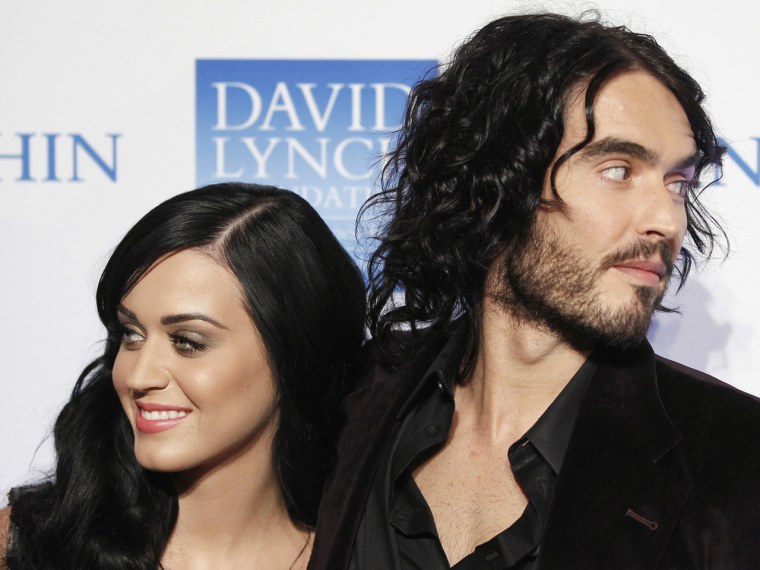 Singer Katy Perry arrives with her husband, actor Russell Brand, for the annual David Lynch Foundation benefit celebration in New York in this Decembe...