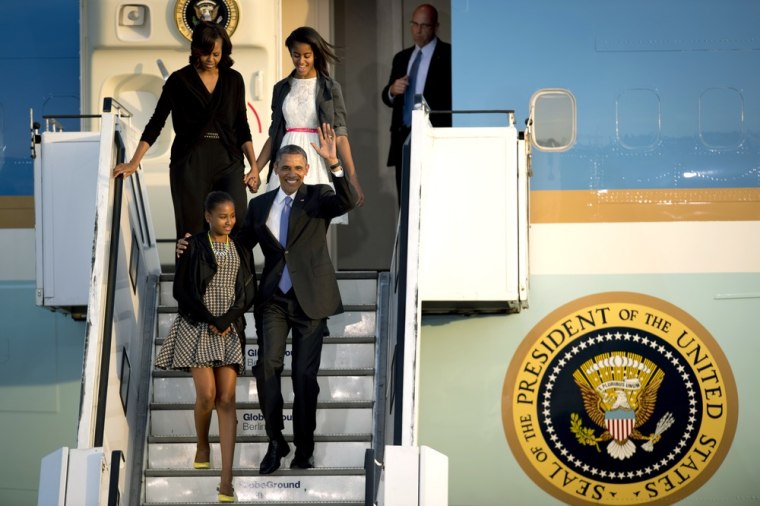 The first family disembarks from Air Force One at Berlin Tegel airport on June 18, 2013.