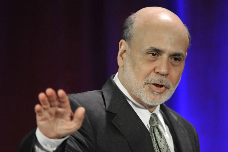 Federal Reserve Chairman Ben Bernanke waves goodbye after speaking during a banking conference in Chicago, Friday, May 10, 2013.