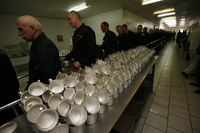 Inmates stand in line for dinner at prison camp number outside the Siberian city of Krasnoyarsk on May 14.