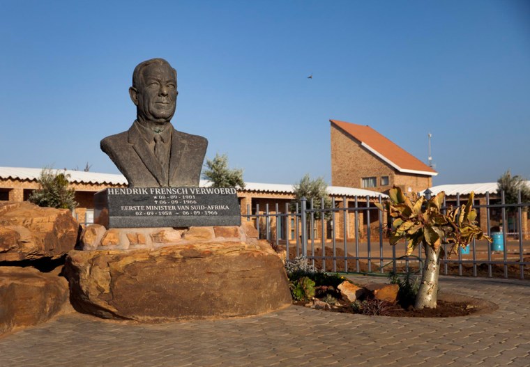A bust of Henrik Verwoerd, who is credited as the father of apartheid, sits near the entrance to Kleinfontein, South Africa.