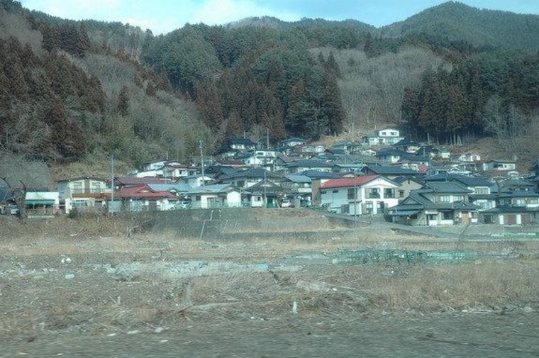 Houses above the inundation zone in this Japanese village survived intact, while everything below was destroyed by the 2011 tsunami.