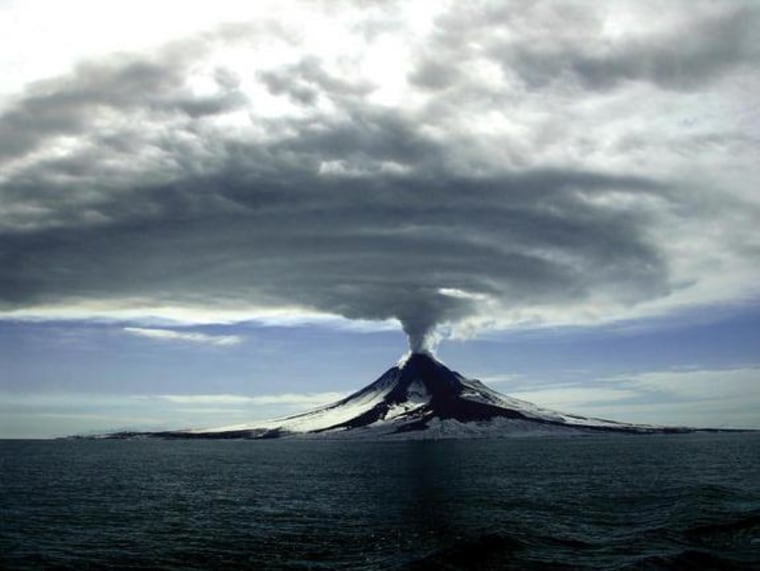 The Augustine volcano lets loose with a plume in Alaska on March 27, 2006.