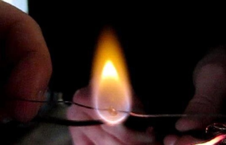 A fuel droplet burns in one-G (Earth gravity), in the University of California, San Diego lab where undergaduate Sam Avery and his team are studying microgravity's effects on fire.