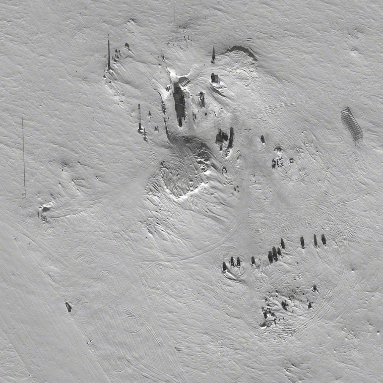 An image from DigitalGlobe's WorldView 1 satellite shows Russia's Vostok Station in Antarctica, the site of a drilling operation that has just reached a subglacial freshwater lake. Lake Vostok may have lain undisturbed for 20 millions of years more than two miles beneath the surface, and thus could harbor living organisms unlike anything scientists have ever seen. The picture was taken on Feb. 8 from an altitude of 308 miles (496 kilometers).