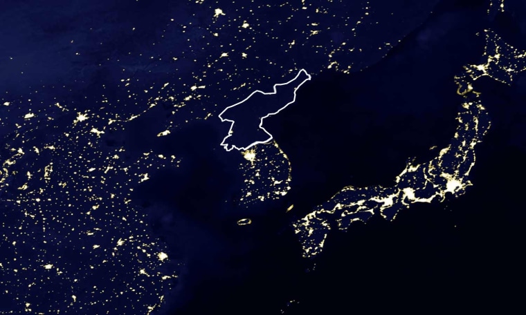 This picture of Earth at night is based on 1994-1995 satellite data from the Defense Meteorological Satellite Program Operational Linescan System, which maps the location of permanent lights on the planet. The borders of North Korea are outlined in white, with Japan off to the right, China to the left and South Korea below.