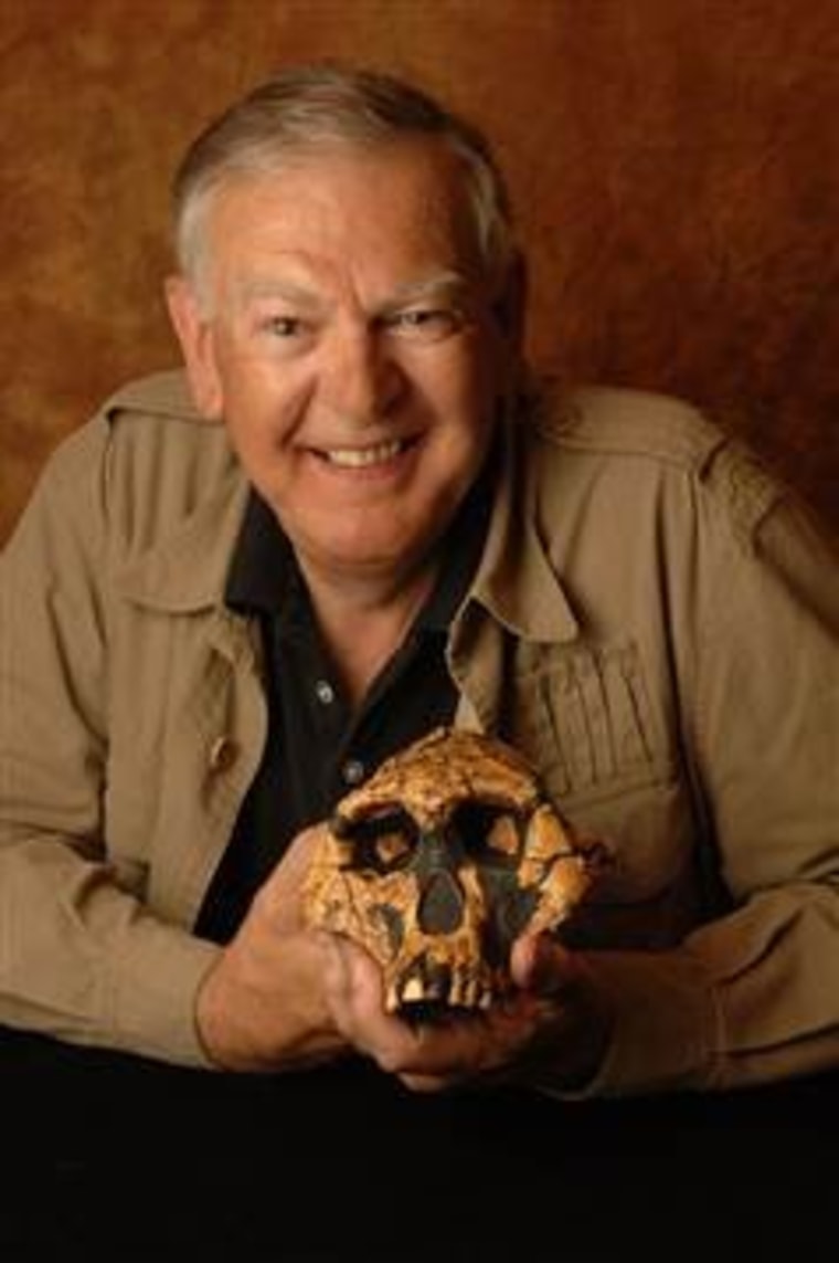 Anthropologist Don Johanson holds a cast of the skull of Lucy, one of the world's best-known hominid fossils.