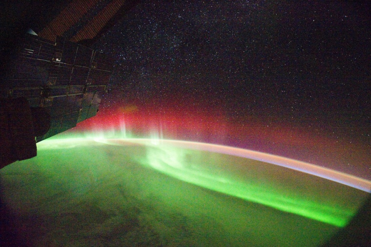 Many auroral displays appear green, but sometimes, as in this Sept. 26 image from the International Space Station, other colors such as red can appear.