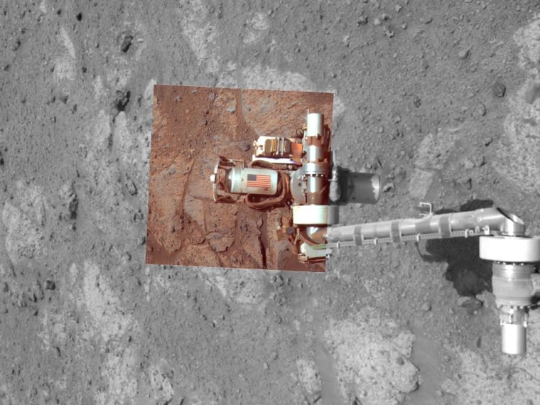 NASA's Opportunity rover produced this mosaic view of its own tribute to the victims and the survivors of the 9/11 terror attacks on Sept. 11, 2011. The component bearing the image of the flag was fashioned out of aluminum salvaged from the World Trade Center towers and serves as the cable guard of a tool on NASA's Mars Exploration Rover Opportunity. Two separate cameras on Opportunity recorded exposures that were combined into this view.
