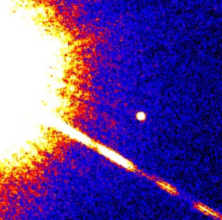 The smaller object in this photo is thought to be a brown-dwarf companion that orbits the distant star Gliese 229. Some have worried that our sun has a similar companion whose gravitational effect periodically sends more comets toward Earth — but the latest analysis of cometary data shows no sign of such an effect.