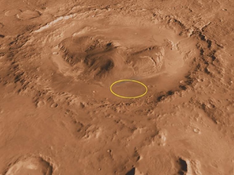 Orbital imagery shows Gale Crater, with the projected landing zone for Curiosity indicated by a yellow ellipse measuring 20 by 25 kilometers (12.4 by 15.5 miles). A 5-kilometer-high (3-mile-high) mountain can be seen just above the landing zone in this oblique, computer-generated view.