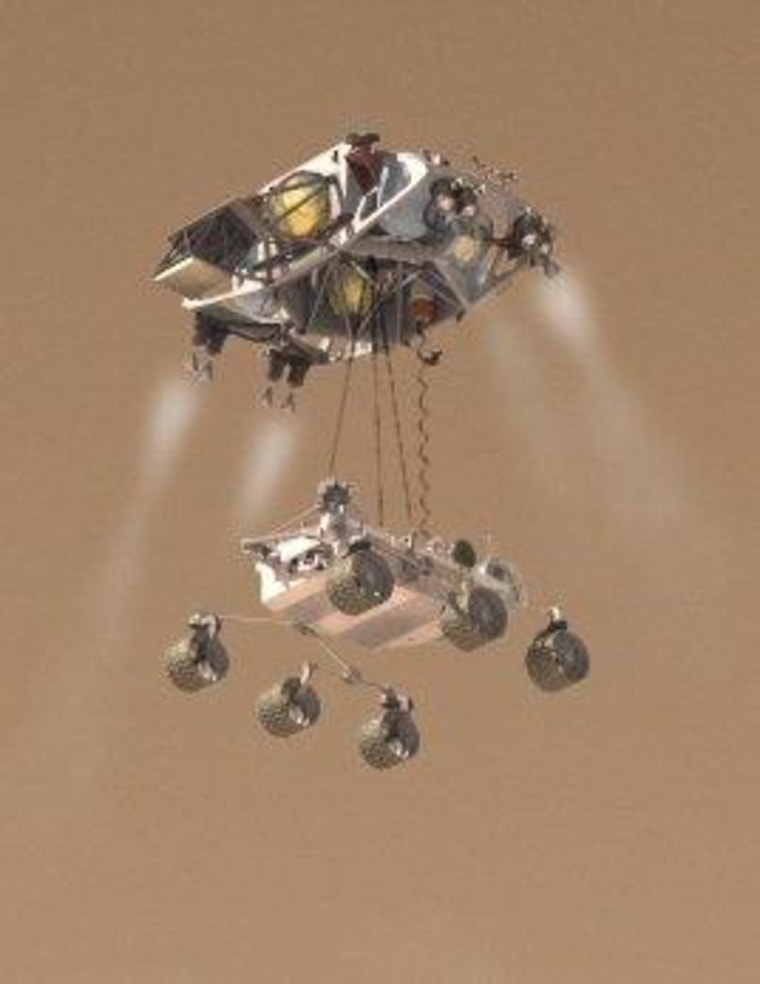 This artist's conception shows the Curiosity rover being lowered toward the Martian surface on tethers from a