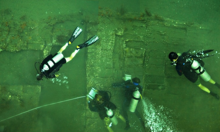 A team of underwater archaeologists study the wreckage of a ship they believe to be part of Captain Henry Morgan's lost fleet.  The dive team discovered part of the starboard side of a 17th-century wooden ship hull and a series of unopened cargo boxes and chests encrusted in coral.