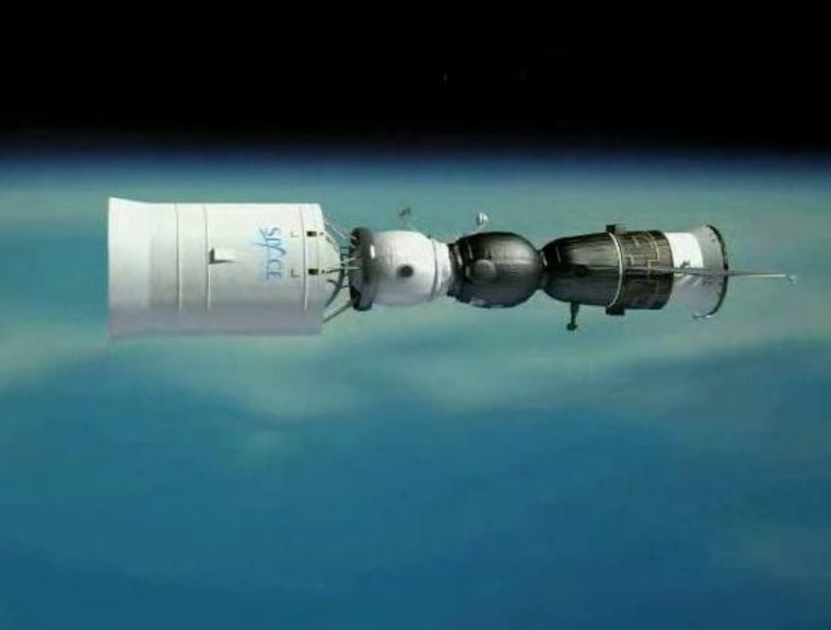 An artist's conception shows a Russian-built propulsion module and habitation module at left, linked up with a Soyuz spacecraft at right to create a complex designed for flying around the moon and back to Earth.