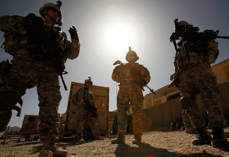 This file photo shows soldiers from the U.S. Army preparing to go on patrol in Afghanistan. Soldiers in the field need up to 7 gallons of water per day.