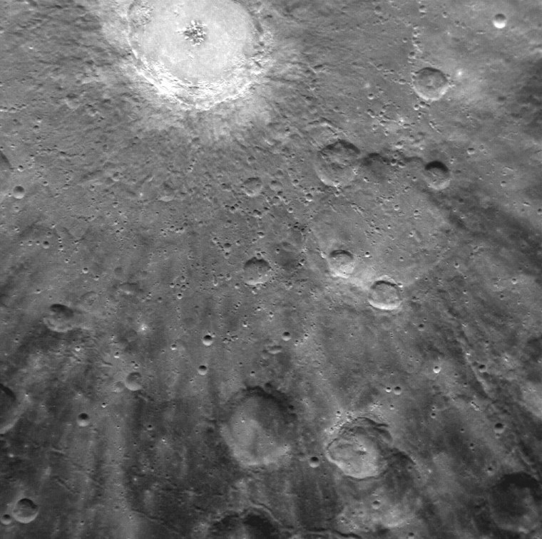 Here's a closer look at Debussy Crater, acquired by Messenger's Narrow Angle Camera on March 29. The bright rays, consisting of impact ejecta and secondary craters, spread out from Debussy at the top of the image. The rays extend for hundreds of miles across Mercury's surface.