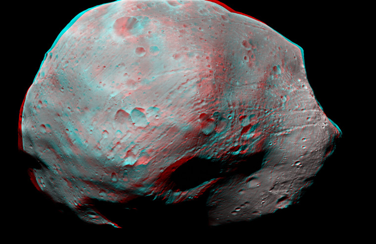 The European Space Agency's Mars Express probe captured this stereo view of the Martian moon Phobos on Jan. 9. Some areas of the image have been adjusted to fix distortions or gaps for 3-D viewing using red-blue glasses.