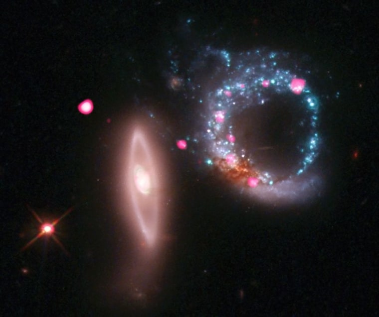 This image shows Arp 147, a pair of interacting galaxies some 430 million light years from Earth, as seen by the Chandra X-ray Observatory and the Hubble Space Telescope. The ring-shaped object on the right is a remnant of a spiral galaxy that collided with the elliptical galaxy to the left millions of years ago.