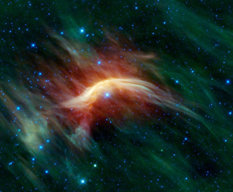 The blue star near the center of this image is Zeta Ophiuchi. When seen in visible light, it looks like a relatively dim star, surrounded by other dim stars and no dust. However, in this infrared image taken with NASA's Wide-field Infrared Survey Explorer, or WISE, a completely different view emerges. Zeta Ophiuchi is actually a very massive, hot, bright blue star plowing its way through a large cloud of interstellar dust and gas.