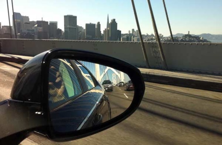 The Bay Bridge can be seen in the side view mirror as the Volt approaches San Francisco after 856 miles of driving.