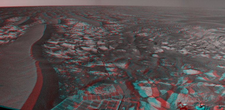 NASA's Opportunity rover snapped this stereo image of the terrain leading to Endeavour Crater on Aug. 18. The 3-D effect can be seen using red-blue glasses. Check out the full-size view on the website for NASA's Mars rovers.