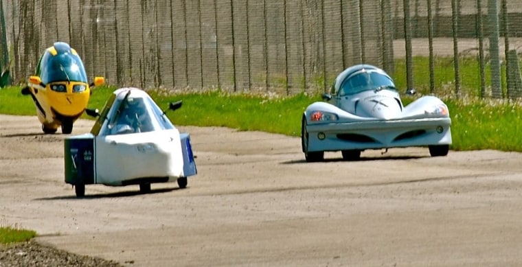 Vehicles fielded by the Spira, FVT Racing and X-Tracer teams roll down the Michigan International Speedway track in May during an X Prize run aimed at testing the cars' durability. Click here for a slideshow featuring X Prize vehicles.