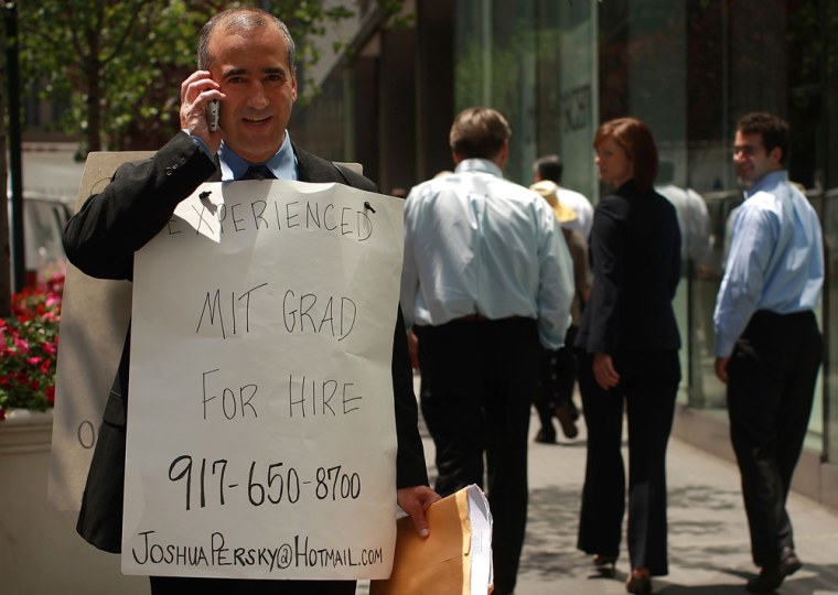 Joshua Persky stands in New York City with a sign proclaiming he's looking for work. Desperate times call for desperate measures.