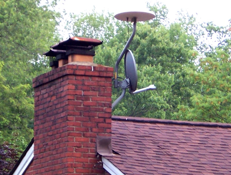 John Davis of Pittsburgh rigged up this over-the-air antenna to his old satellite dish; he's saving money and getting a great picture.