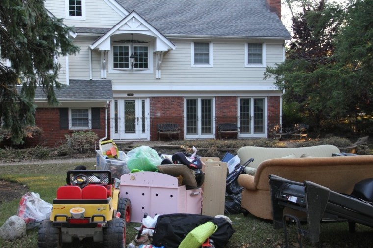 A tell-tale water line about half-way up the ground floor of this home indicates how high the floodwaters rose.