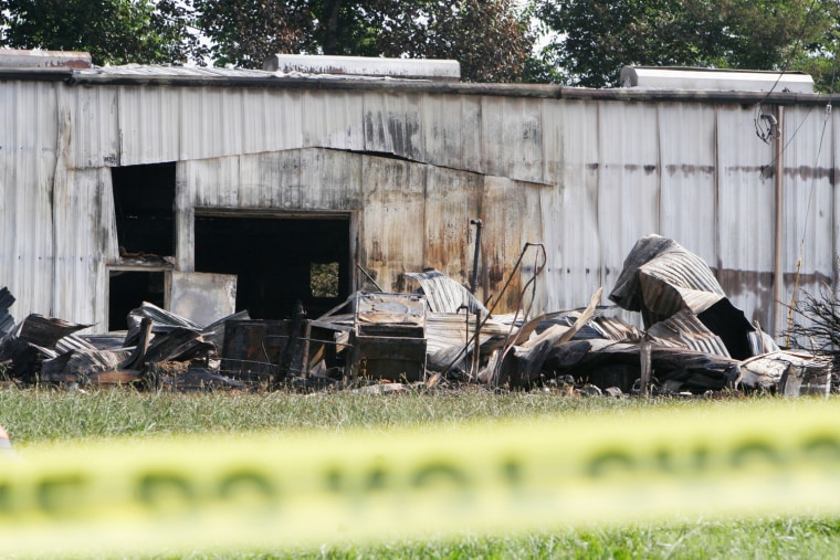 Investigators begin to search for the cause of the fire that leveled a 44-year-old structure that also claimed 35 horses at Happy Valley Farm in Rossville, Ga.