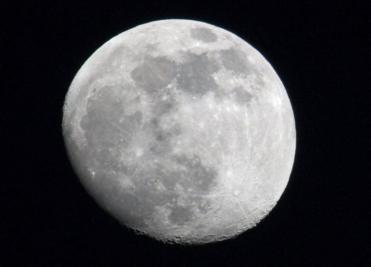 This photo of the moon over Des Moines, Iowa, was captured using a Canon Rebel XS camera.