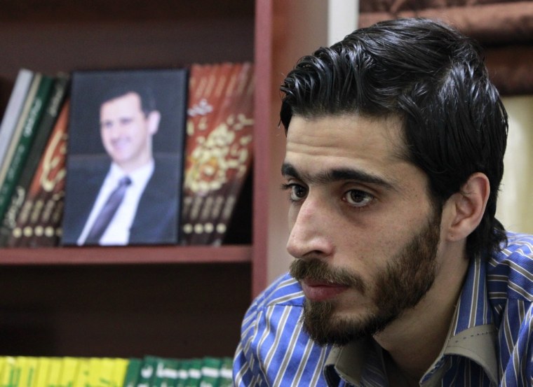 Ali Faddah, a senior official with the pro-Syrian Arab Democratic Party, speaks during an interview with The Associated Press at the party's offices on April 30, 2013, in the predominantly Alawite neighborhood of Jabal Mohsen in the northern port city of Tripoli, Lebanon.
