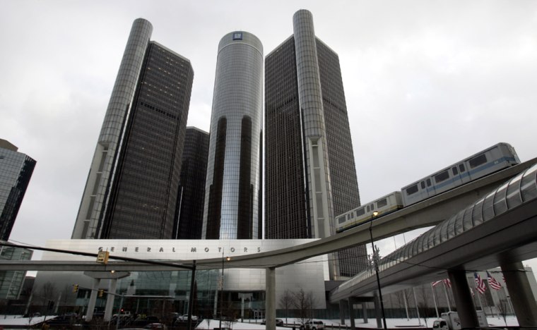** FOR IMMEDIATE RELEASE **Detroit's elevated people mover drives by the Renaissance Center on Dec. 16, 2005.The skyscrapers of the Renaissance Center...