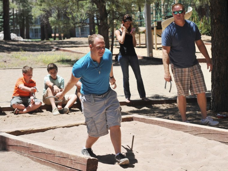 FLAGSTAFF, AZ - JUNE 23: (EXCLUSIVE COVERAGE) Nik Wallenda plays horseshoes with his family and friends in the hours before his historic highwire walk...