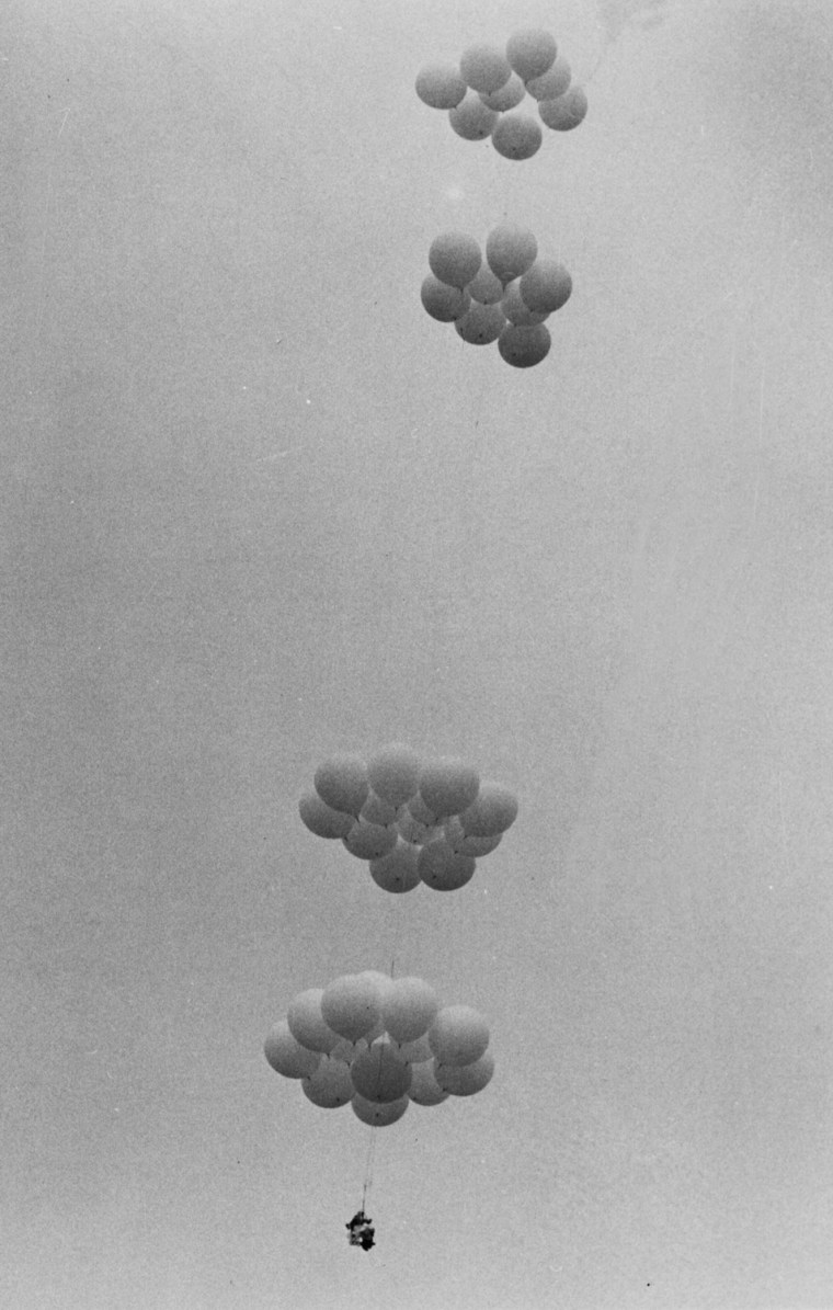 Larry Walters is barely visible as his helium balloon-rigged aluminum lawnchair drifts skyward after tether lines broke during what was supposed to be a short flight, on July 2, 1982. The flight turned into a 45-minute venture during which Walters was spotted by pilots of TWA and Delta jetliners at an altitude of 16,000 feet.