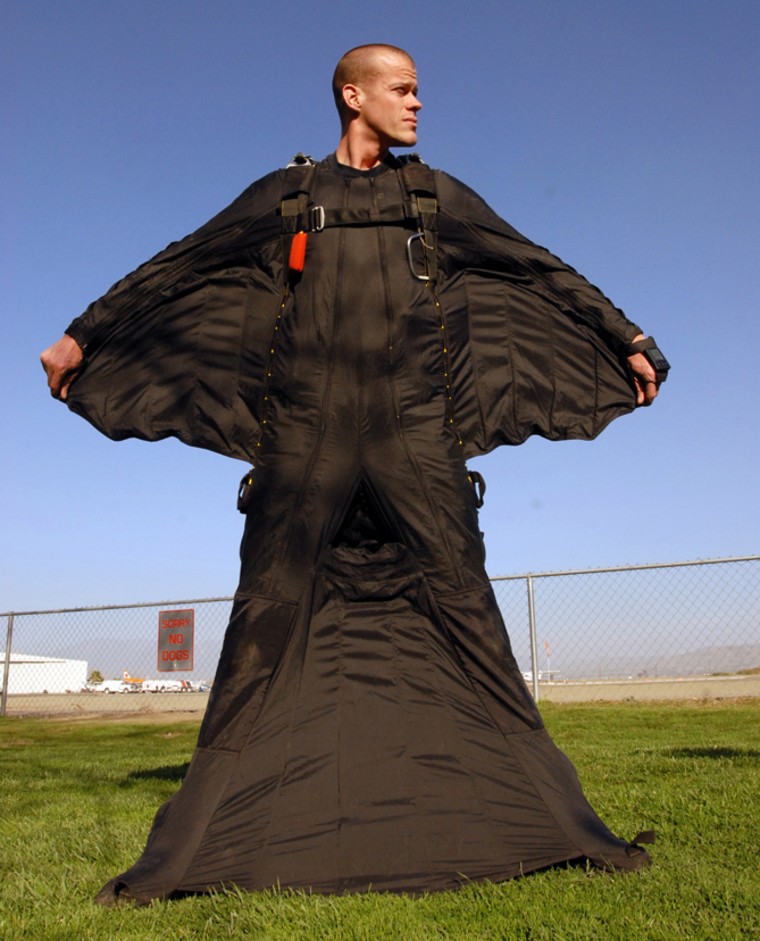 Jeb Corliss shows one of his wingsuits at Perris Valley Skydiving complex in November 2007, in Perris, Calif. Corliss has developed a