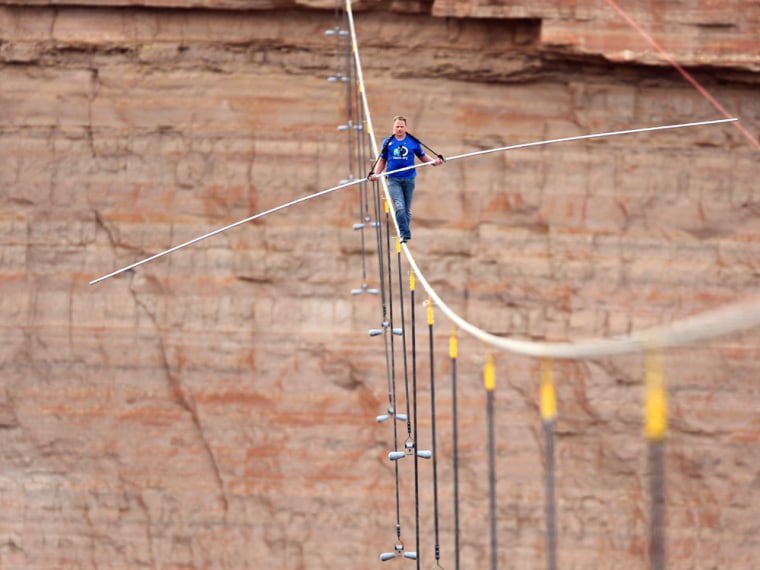 Nik Wallenda, a seventh-generation member of the famous “Flying Wallendas” family, became the first person to walk across the Grand Canyon on a wire that's the width of two bottle caps.