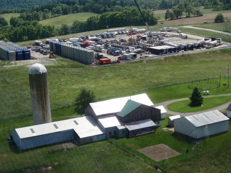 A Marcellus shale gas extraction well pad and farm in Pennsylvania. New research finds contaminated drinking water, in some cases, in homes within one kilometer of these wells.