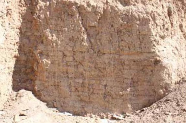 Among the things the bulldozer exposed was this wall dating back more than 4,000 years.