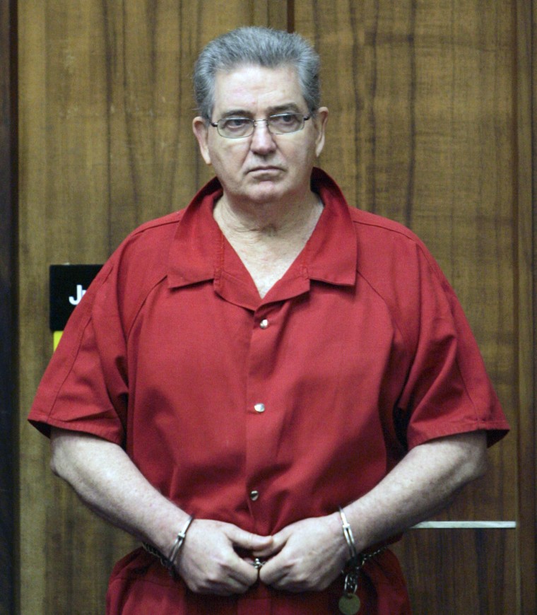 John Connolly stands after a hearing Thursday, Sept. 4, 2008 in Miami.