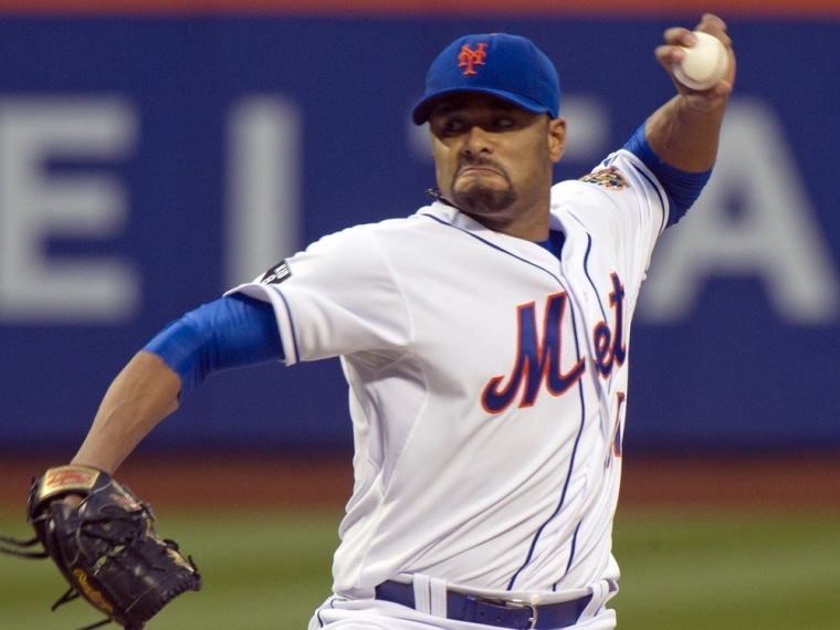 New York Mets starting pitcher Johan Santana throws a pitch to the St. Louis Cardinals in the first inning of their MLB National League game at CitiFi...
