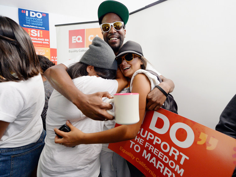 Couples not only celebrated with one another, but also their friends and fellow supporters. Here, Brandon Benoit hugs Martha Acevedo (L) and Briana Castaneda as they celebrate the Supreme Court ruling at a watch party at Equality California in West Hollywood.