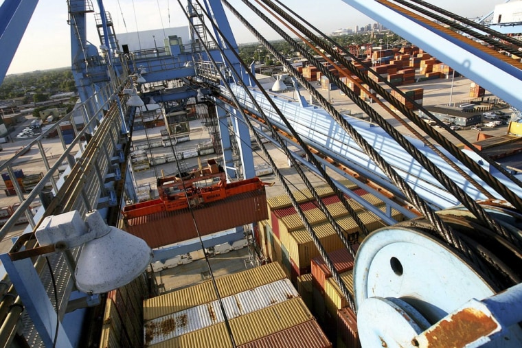 Crews load and unload consumer products at the Port of New Orleans along the Mississippi River in New Orleans, Louisiana in this file photo taken June...