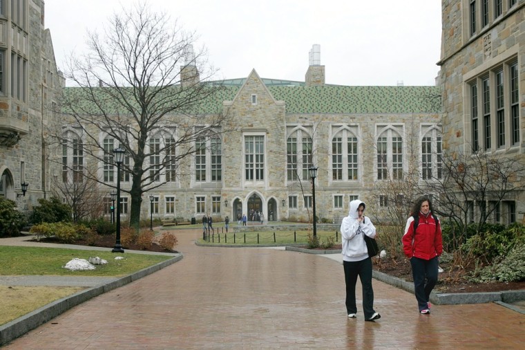 Boston College students walk across the college campus in Boston, March 29, 2005.