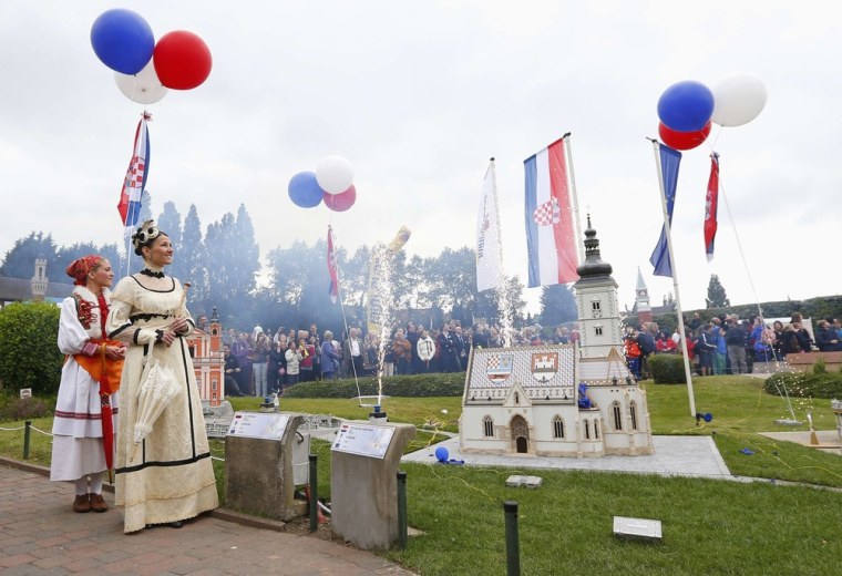 A miniature reproduction of Saint Mark's Church of Zagreb is inaugurated at Mini-Europe park in Brussels, Belgium, on Monday. Croatia, which applied for European Union membership in 2003, is set to become the bloc's 28th member.