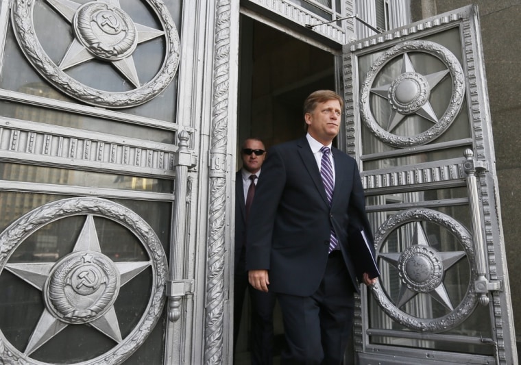 U.S. Ambassador to Russia Michael McFaul leaves the Russian Foreign Ministry headquarters in Moscow, Russia, May 15 2013.
