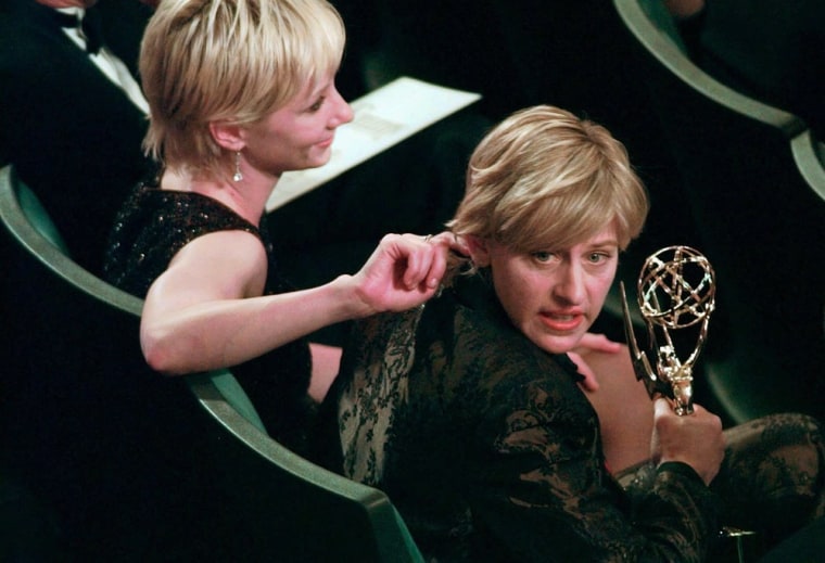 Anne Heche plays with Ellen DeGeneres' hair at the 49th Annual Primetime Emmy Awards, Sunday Sept. 14, 1997 in Pasadena, Calif. DeGeneres won an award for outstanding writing for a comedy series for