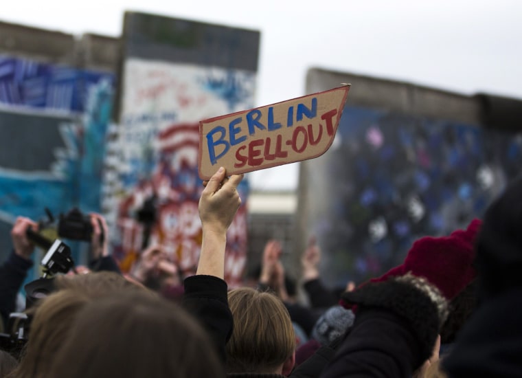 People protest against the removal of a segment of the former Berlin Wall, now known as East Side Gallery, in Berlin on March 1, 2013.